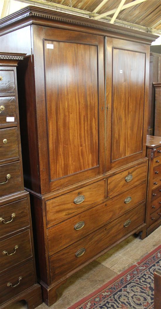 Early 19th century mahogany linen press, converted to a hanging cupboard